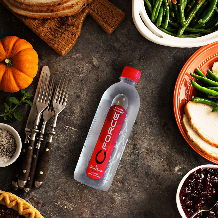 CForce water sitting on table with healthy food ingredients