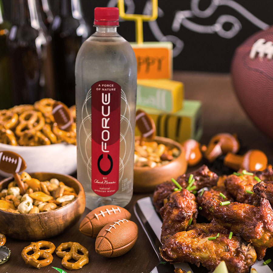 CForce water bottle on table with finger food snacks