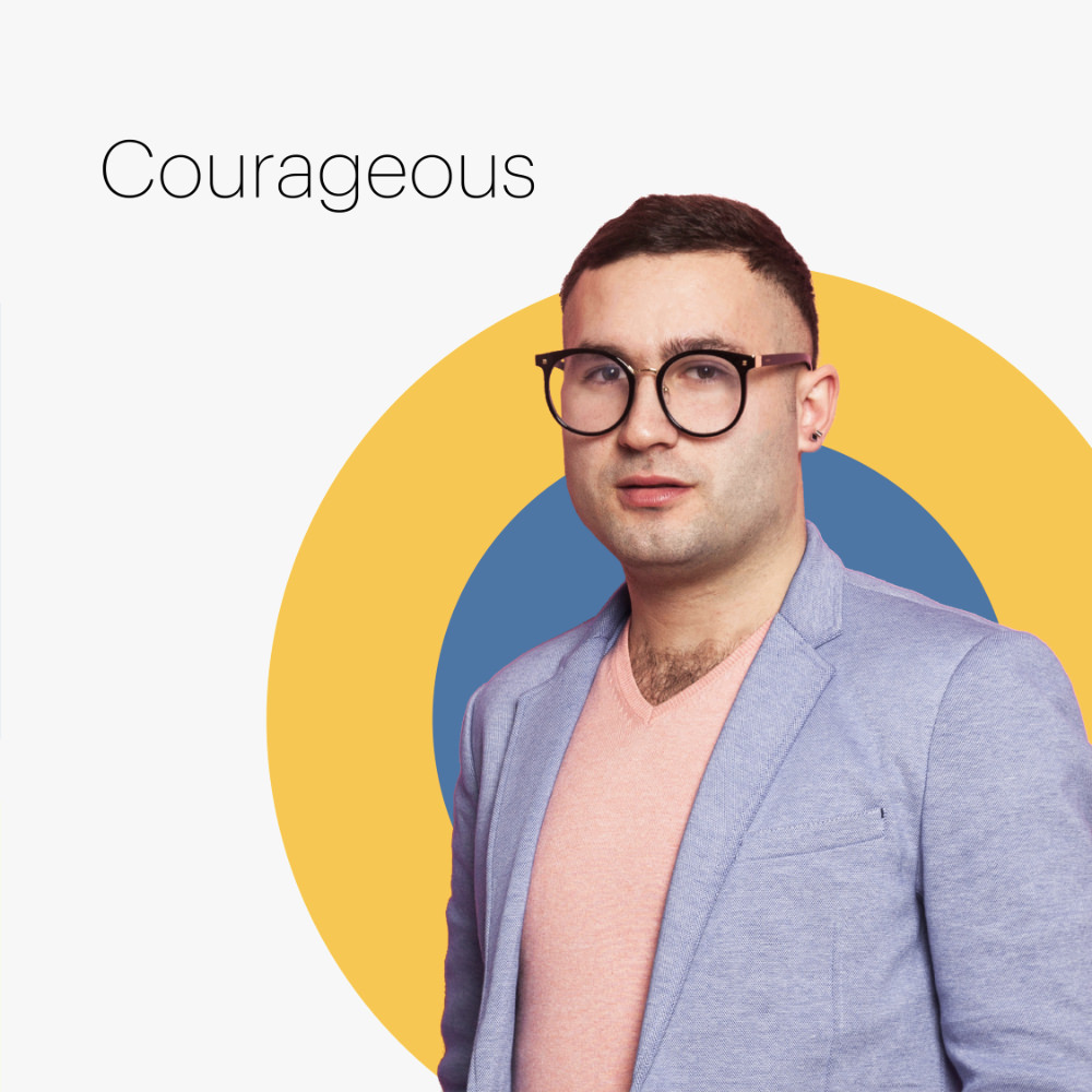 man on multicolored circles with the word courageous