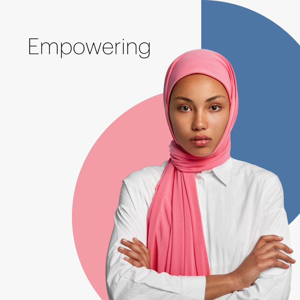 a woman in a hijab with the word empowering