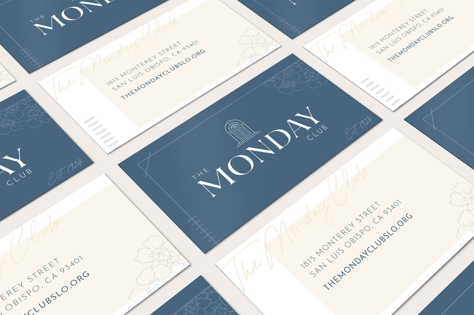 The Monday Club business cards flat lay